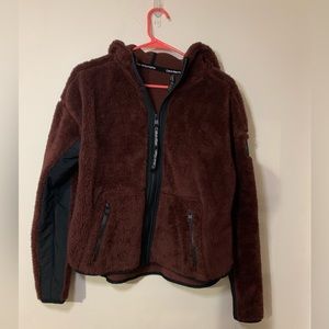 New! Calvin Klein Brown and Black zip up plush sweater. Size small.